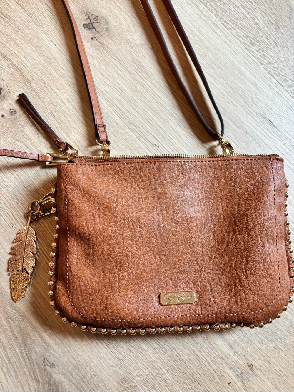 Jessica Simpson Tan Leather Crossbody with Gold Studs & Feather Charm